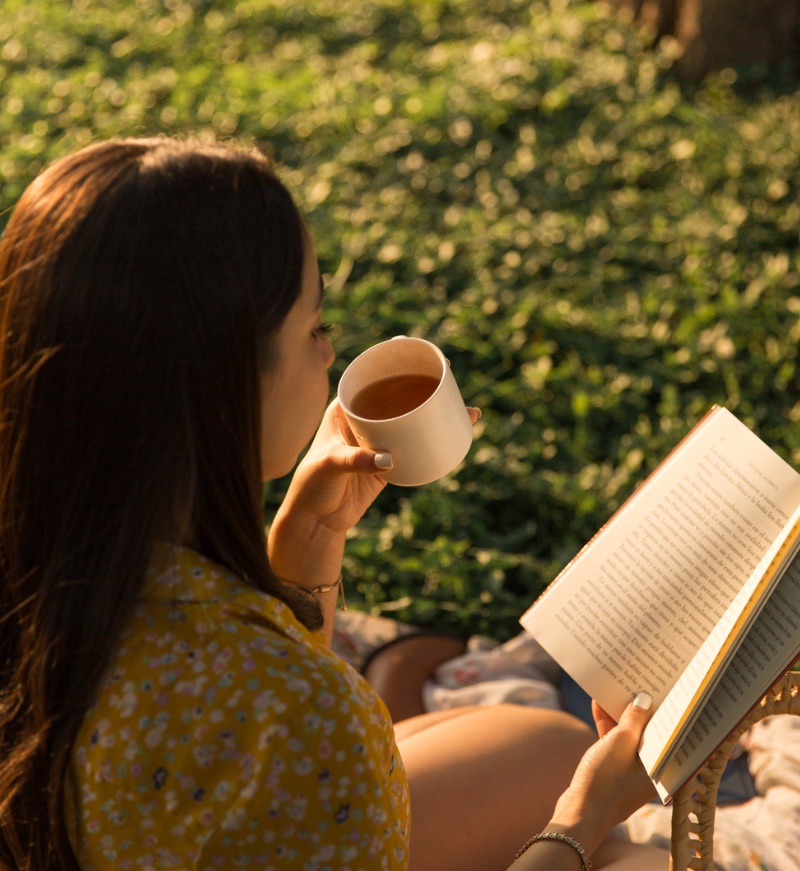 Woman reading books to learn.