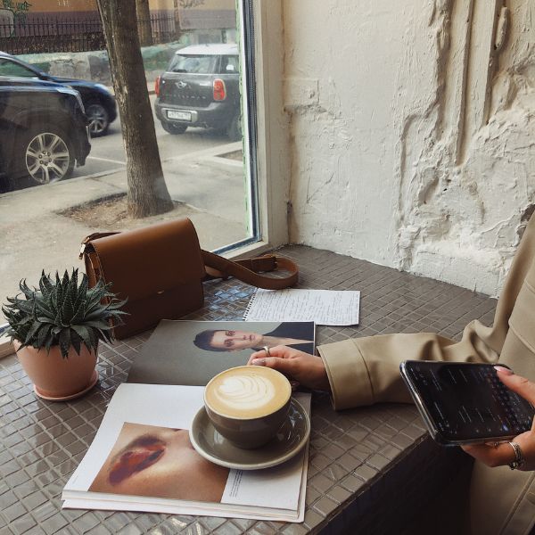 woman working in cafe and getting things done