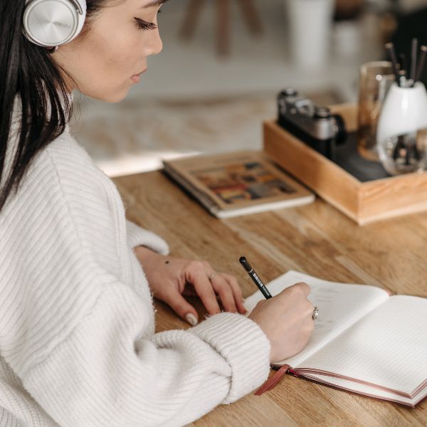 woman creating a list for fun things to do. 